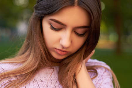Shame and shyness facial expression. Shy girlの写真素材