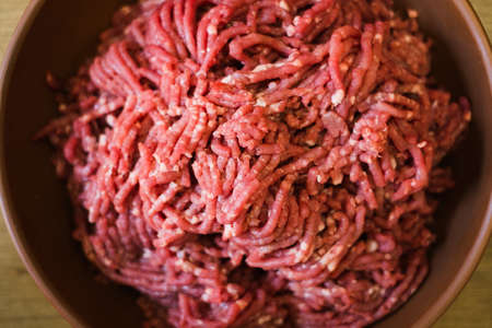 Culinary forcemeat meat burger kitchen handmade cutlet cooking preparation restaurant food ingredients backgroundの写真素材