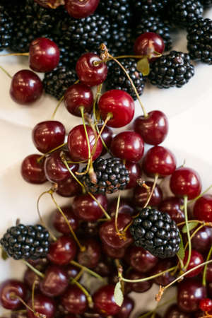 Detox diet healthy food vegetarian berries fresh natural vitamins raw summer conceptの写真素材