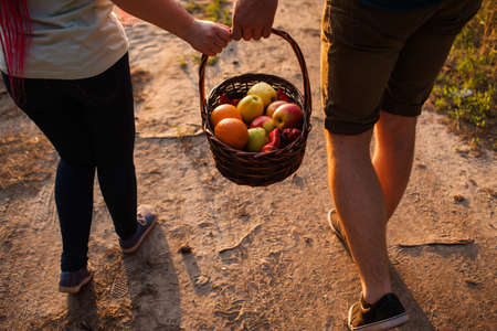 Couple walk informal meadow picnic love concept. Hiker lifestyle. Together on the nature. Advertisement of proper nutrition.の写真素材