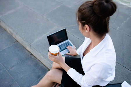 coffee break business woman lifestyle laptop outdoor work proccess conceptの写真素材