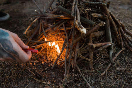 Bonfire preparation tourism nature forest concept. Hiking spirit.の写真素材