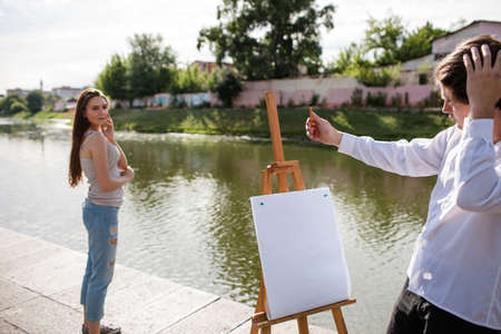 Artist woman portrait posing city concept. Lifestyle of talented people. Process of proportioningの写真素材