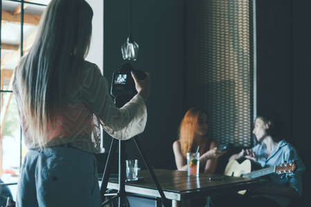 famous musician gives interview to post in his blog. Social networking communication vlog conceptの写真素材