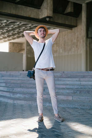 tourist photography. content relaxed traveler after a day of exploration has tons of photographs on his camera. new experiences and happy memories conceptの写真素材