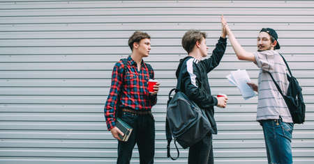 successful examination. students pass exams. teenagers enroll at university. choosing future profession conceptの写真素材