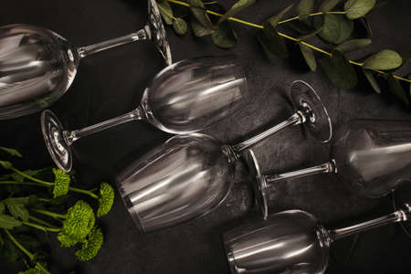 Wine glasses on black background. Creativity art and contrast color conceptの写真素材