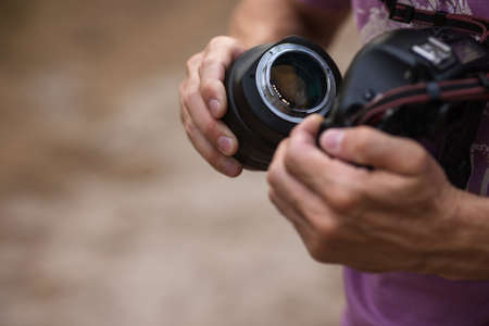 Photo camera technology Photographer equipment. Photo creating process. Unity with nature.の写真素材