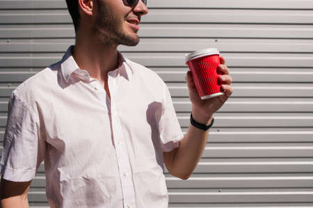 business man has a coffee break. energy drink to keep up effective work during the day concept