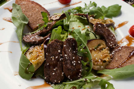 baked meat with grilled vegetables salad. healthy food. closeup concept. proper and delicious...