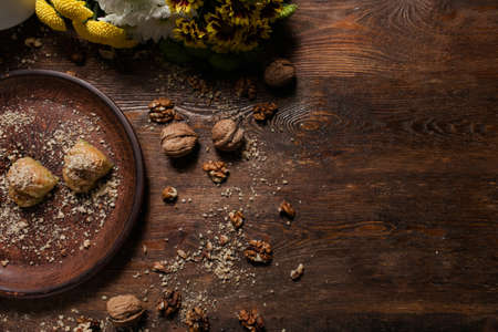 Food background. Baklava on a rustic plate. Turkish dessert concept