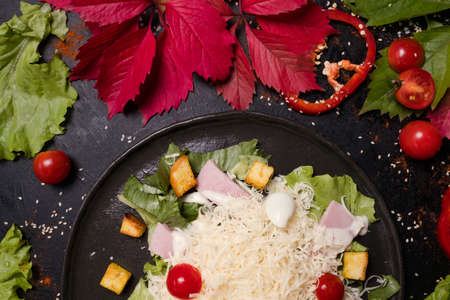 cooking recipe of delicious caesar salad. food ingredients. nourishing mealの写真素材