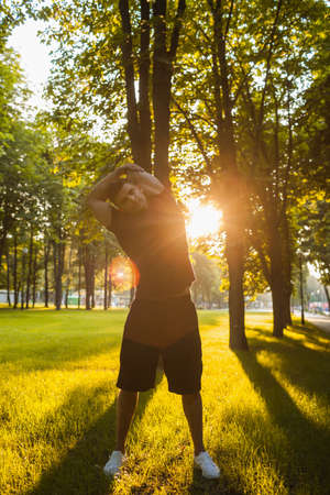 healthy man outdoor fitness training concept. lifestyle of sportsman. fresh air lovers.の写真素材