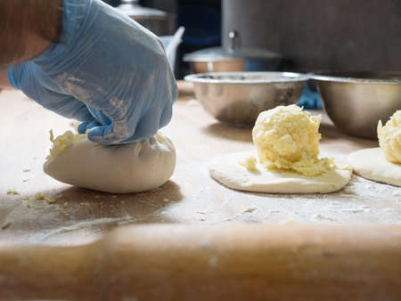Khachapuri with cheese preparing. National Georgian cuisineの写真素材