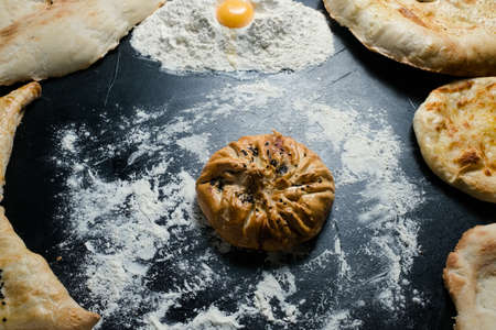 creative baked khinkali - national Georgian cuisine dish. Ethnic travel food conceptの写真素材