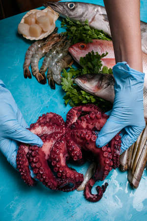 Restaurant seafood preparation waiter concept. Culinary delights. Proper nutrition.の写真素材