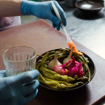 Cook oiling pickled vegetables. Sour appetizers. Raw food healthy diet, vegetarian mealsの写真素材