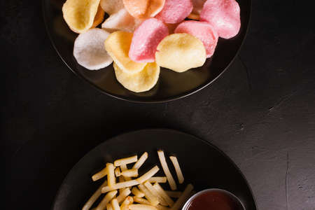 food photography art. french fries chips junk food concept