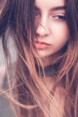 Beautiful depressed woman portrait concept. sad memoriesの写真素材