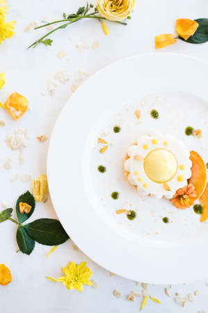 soft and delicious cheesecake on white background. dessert for children. floral decoration. confectionery art.の写真素材