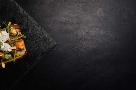 restaurant gourmet food on dark background. free space concept. delicious delicacyの写真素材