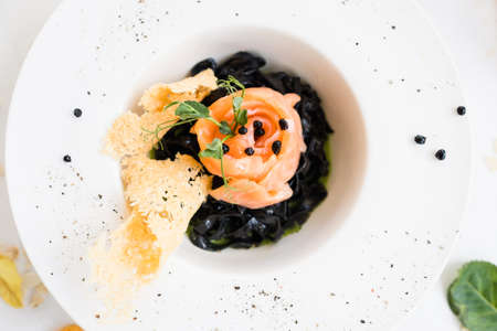 gourmet breakfast meal black pasta nero concept. luxury food. delicacy recipe.の写真素材