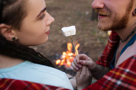 Couple romance nature picnic marshmallows concept. Happy together. Travel lifestyle.の写真素材