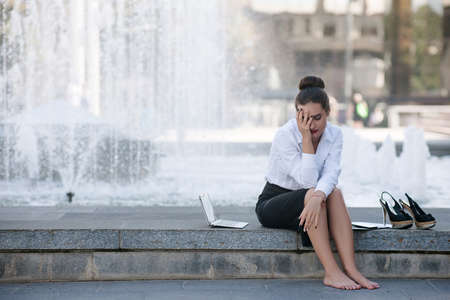 business failure loss bankruptcy crisis despair headache conceptの写真素材