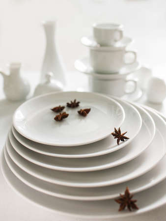 Restaurant white tableware assortment. Stylish crockery set. Purity and luxury conceptの写真素材
