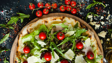 Chefs pizza with meat and vegetables. Special restaurant meal conceptの写真素材