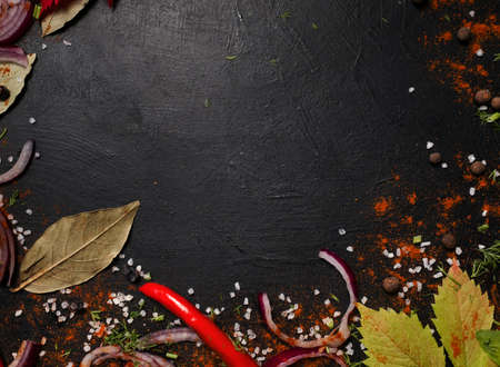 autumnal kitchen veggies pieces negative space concept. food ingredients on dark background. vegan lifestyleの写真素材