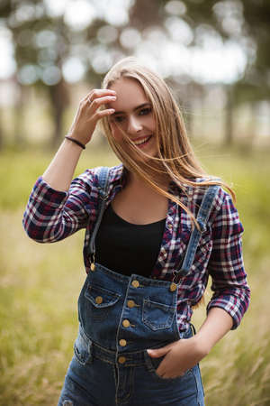 Happy woman nature portrait fashion concept. The pleasure of traveling. Forest photoshoot.