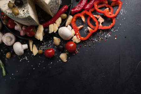 food photography art. gourmet blue cheese vegetables spices assortment mix concept