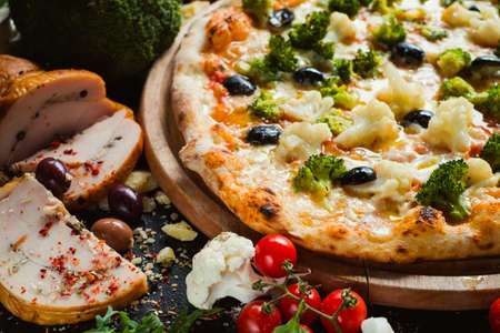 Cauliflower and broccoli pizza. Diet dish with lots of vegetable proteins for healthy nutrition conceptの写真素材