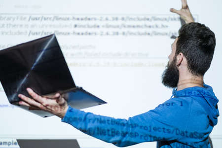 Lecturer explains main notions at seo courses. Business optimization, content analysis and internet technology explainedの写真素材