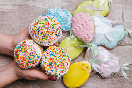easter cakes and gingerbread colorful cookies. festive traditional holiday food baked pastryの写真素材