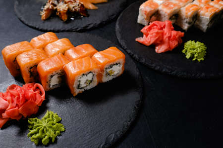 philadelphia sushi rolls on dark background. Asian cuisine. Traditional oriental foodの写真素材