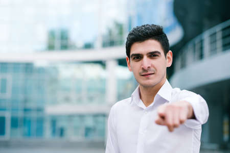 corporate career. confident business man pointing a finger as if choosing you to work in his company. copy space conceptの写真素材