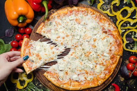 national italian meal. delicious pizza slice with melted cheese. tasty foodの写真素材