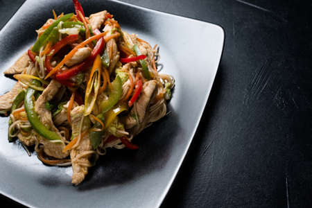 chicken vegetable salad on a plate. traditional asian cuisine food preparation craftの写真素材