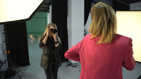 backstage fashion photography. model and photographer lifestyle. professional workspace