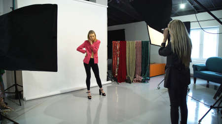 backstage fashion photography. model work lifestyle. young girl posingの写真素材