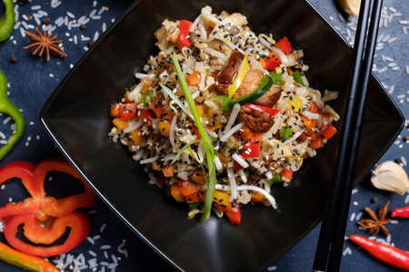 oriental traditional food culture. chopsticks as traditional cutlery. veggie wheat sprouts salad.の写真素材