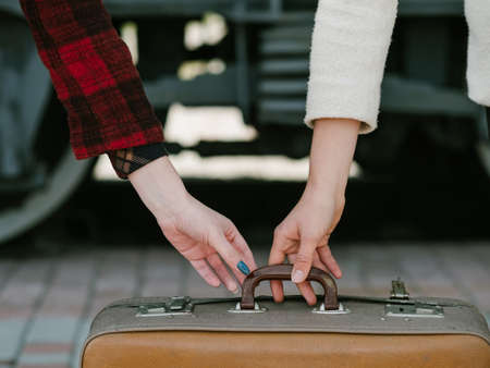 travel safety. scam theft danger. trip voyage holiday vacation concept. woman trying to steal baggageの写真素材