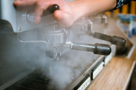 coffee machine preparation steaming before brewing hot strong beverage.の写真素材