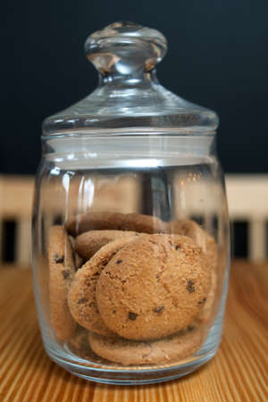 food pastry. chocolate chip cookies in a jar. sweet simple tea or coffee snackの写真素材