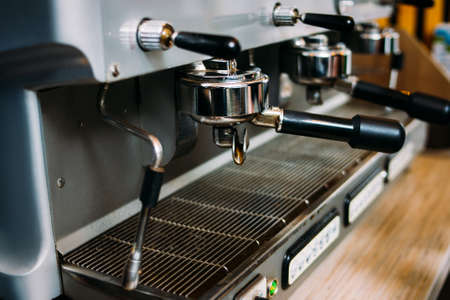 coffee machine. professional modern restaurant or bar equipment. espresso cappuccino latte brewer. drink preparing processの写真素材