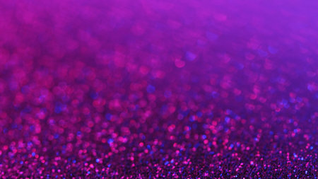 Glitter background confetti purple light bokehの写真素材