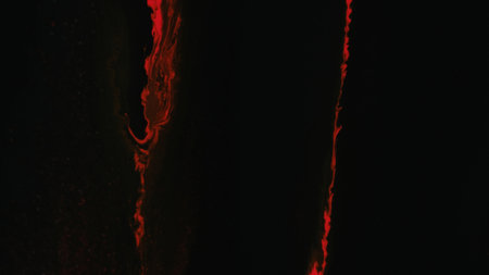 Paint pouring glitter ink spill red blue dye blackの写真素材