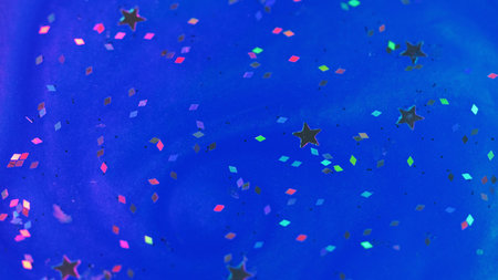 Abstract background shimmering sequins blue inkの写真素材